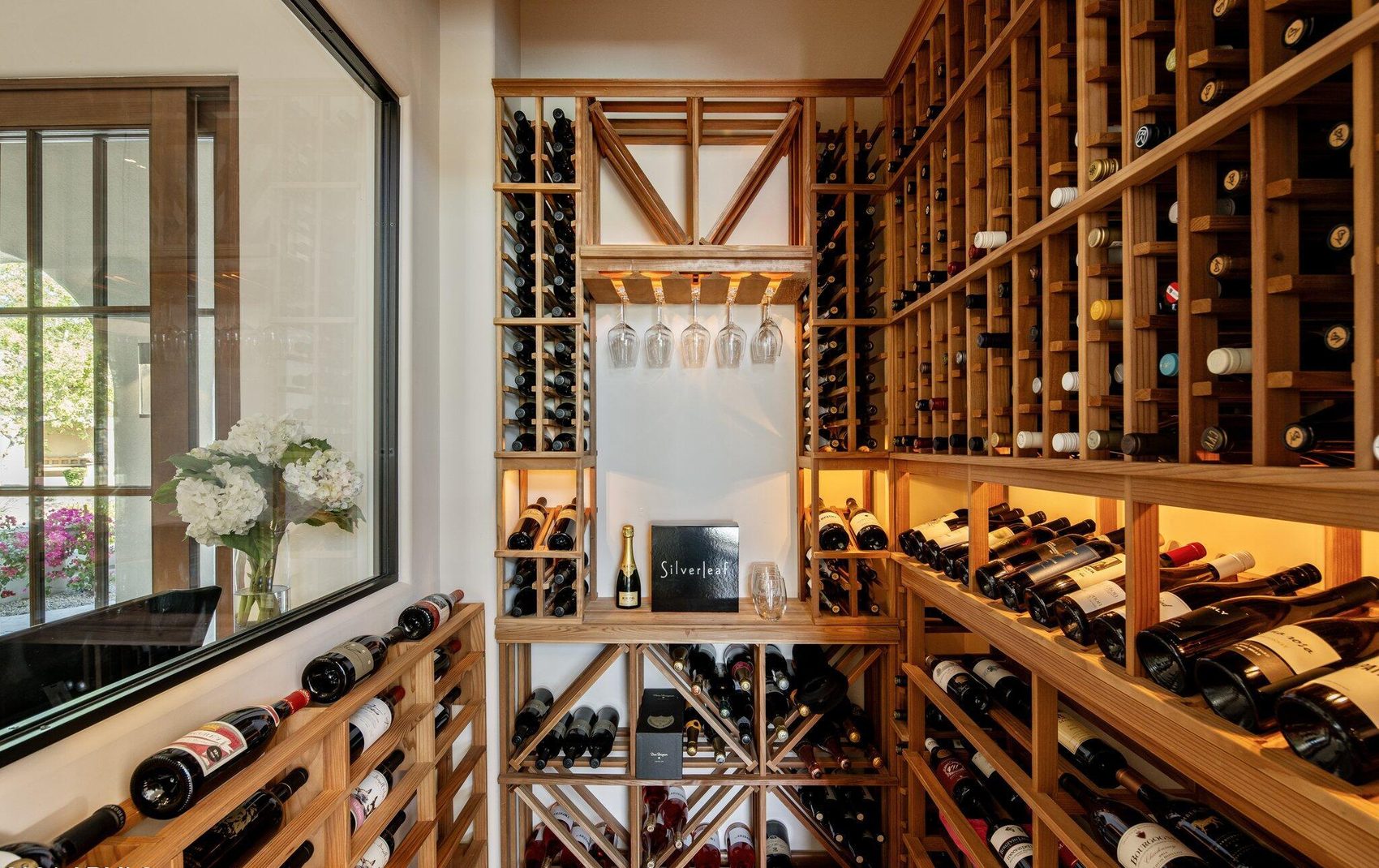 Floor-to-ceiling white oak wine room